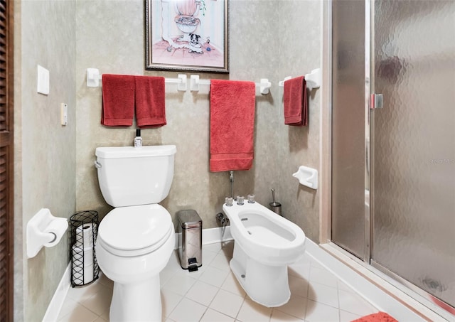 bathroom featuring walk in shower, tile patterned flooring, toilet, and a bidet