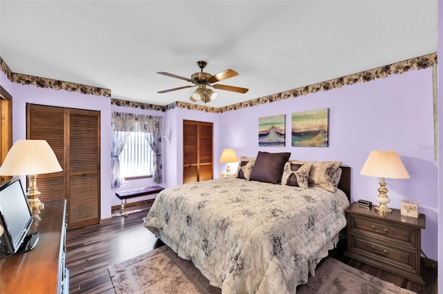 bedroom with ceiling fan and dark hardwood / wood-style flooring