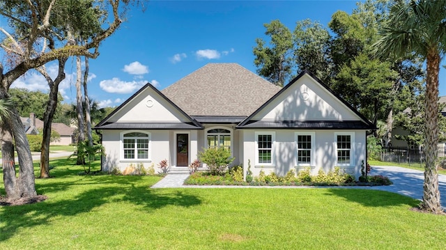 view of front of property with a front lawn