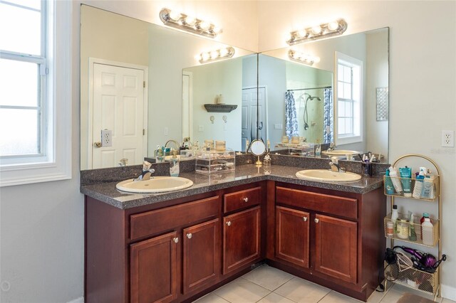 bathroom with vanity and tile patterned floors