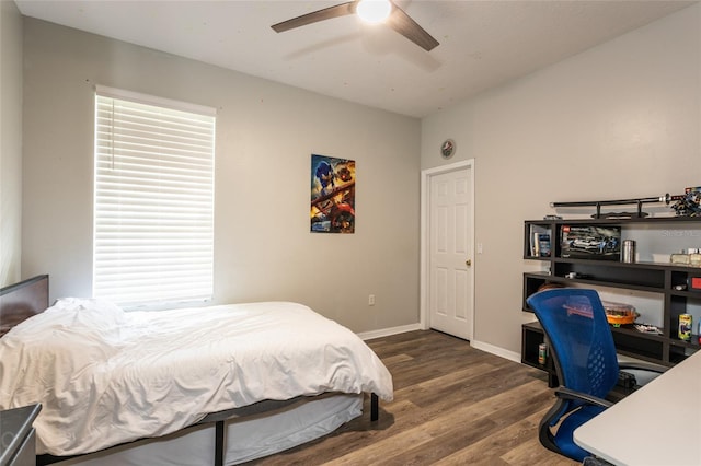 bedroom with wood-type flooring and ceiling fan