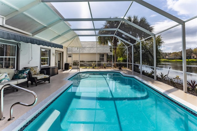 view of pool featuring a patio area, a lanai, and a water view