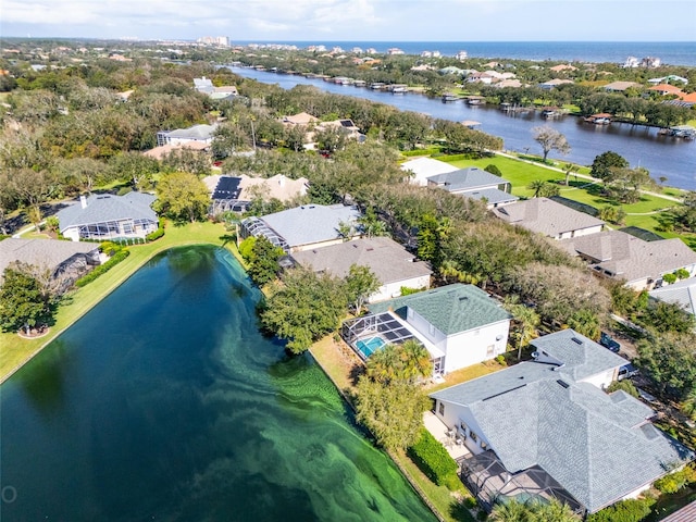 drone / aerial view featuring a water view