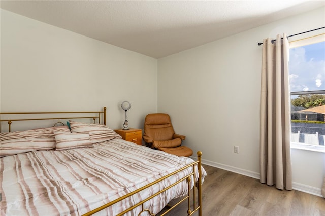30 Front St, Palm Coast, FL 32137 - bedroom featuring wood finished floors and baseboards