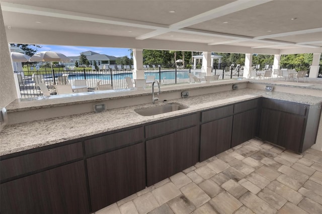 interior space with a community pool and sink