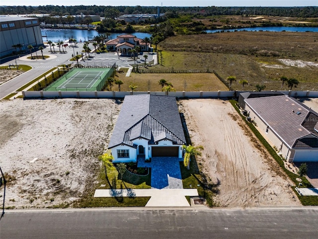 bird's eye view with a water view