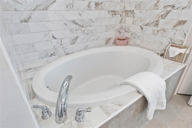 bathroom featuring a relaxing tiled tub