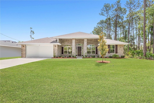 ranch-style house featuring a front yard and a garage