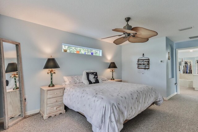 12 S Lakewalk Dr, Palm Coast, FL 32137 - bedroom featuring light colored carpet, baseboards, and a ceiling fan