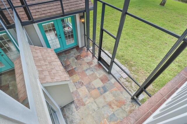 12 S Lakewalk Dr, Palm Coast, FL 32137 - unfurnished sunroom featuring french doors