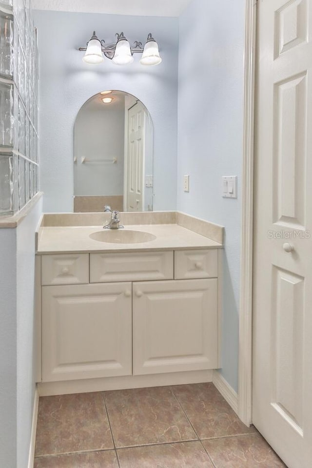 bathroom featuring tile patterned floors and vanity