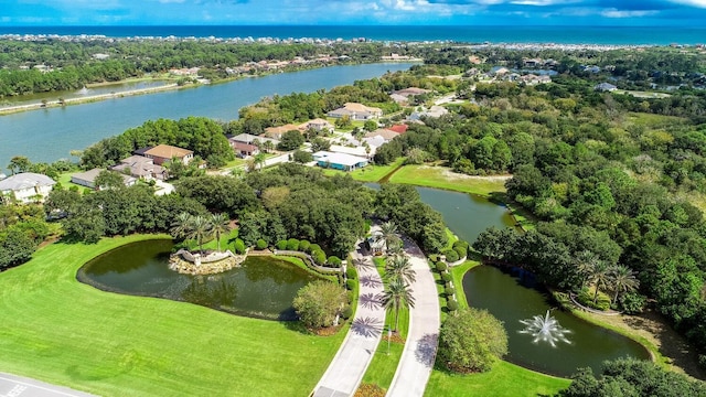 bird's eye view with a water view