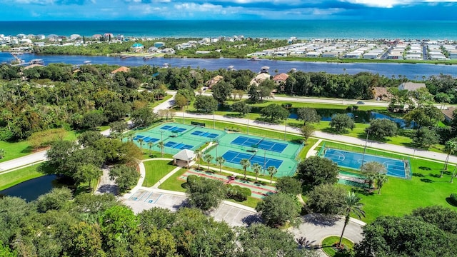 birds eye view of property featuring a water view