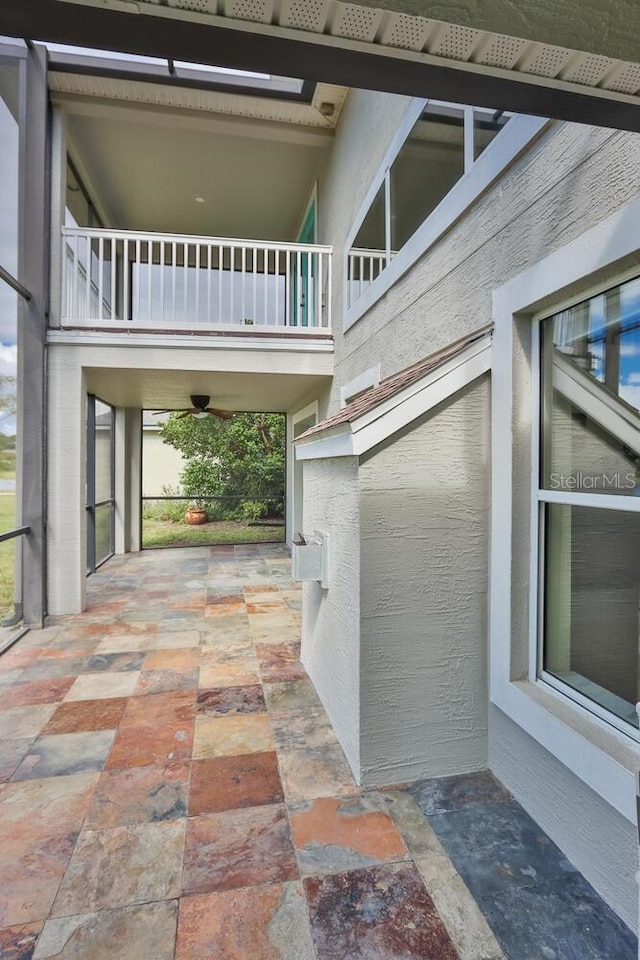 view of patio with ceiling fan