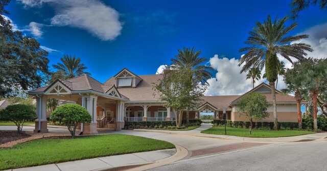 view of front facade with a porch and a front yard