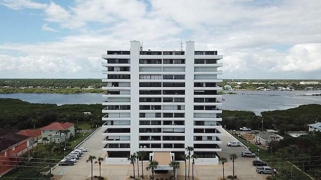 view of building exterior with a water view