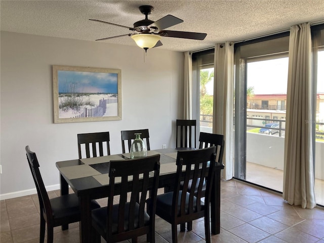 1601 N Central Ave Unit 104, Flagler Beach, FL 32136 - tiled dining space featuring a textured ceiling, baseboards, and a ceiling fan