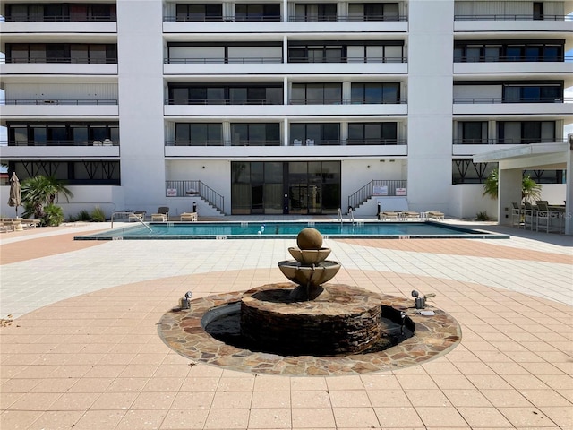 1601 N Central Ave Unit 104, Flagler Beach, FL 32136 - pool featuring a patio