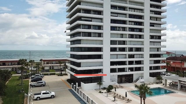 1601 N Central Ave Unit 104, Flagler Beach, FL 32136 - view of property with a water view and a community pool