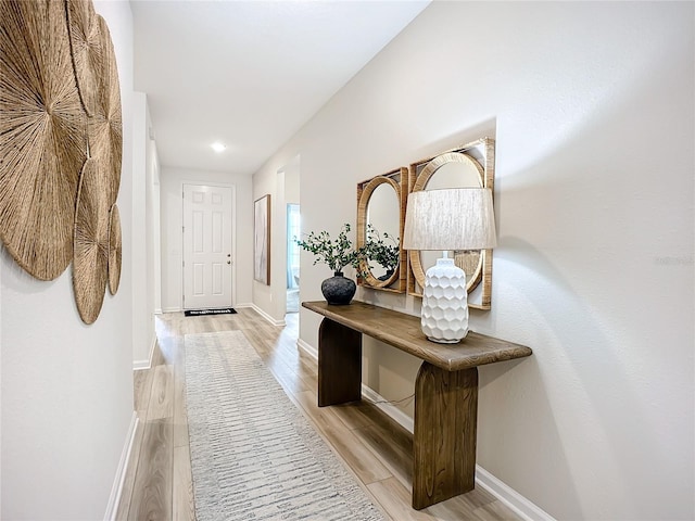 hallway featuring light hardwood / wood-style flooring