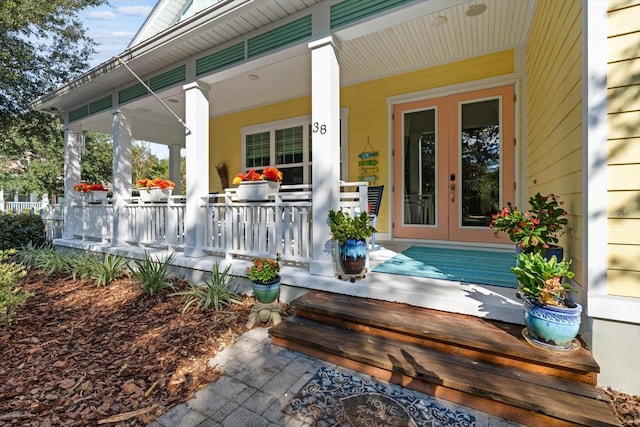 entrance to property featuring covered porch