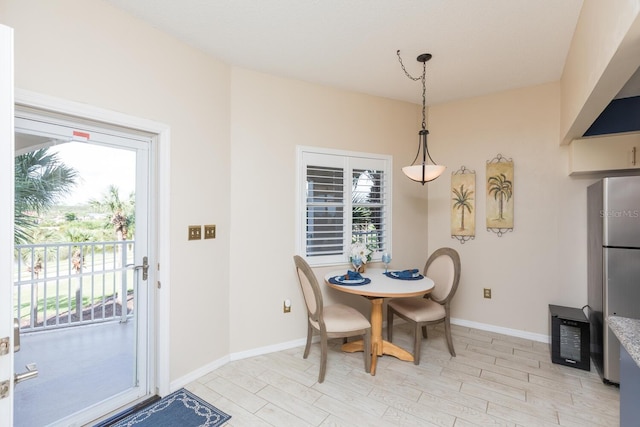 dining room with light hardwood / wood-style floors