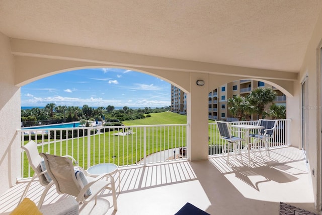 view of patio / terrace with a balcony