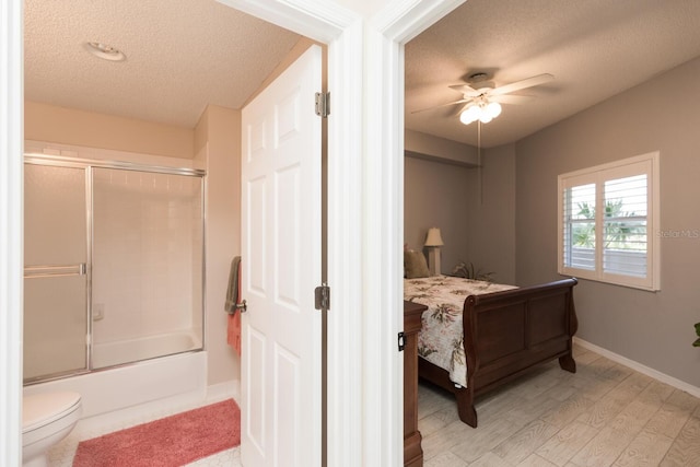 bedroom with a textured ceiling, light wood-type flooring, and ceiling fan