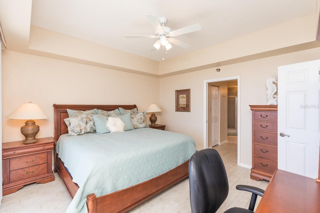 bedroom featuring ceiling fan and baseboards