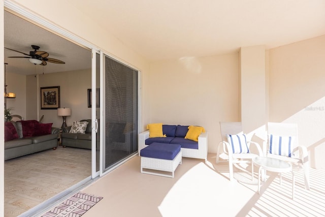 view of patio featuring ceiling fan