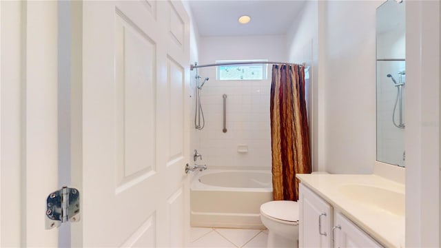 full bathroom with tile patterned flooring, shower / tub combo, vanity, and toilet