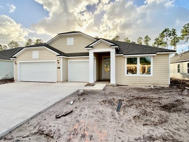 view of front of home featuring a garage