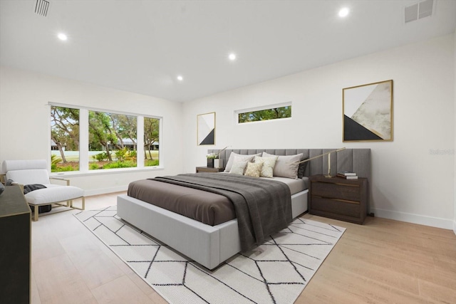 bedroom featuring light wood-type flooring