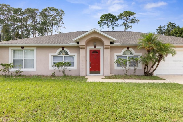 ranch-style house with a front lawn and a garage