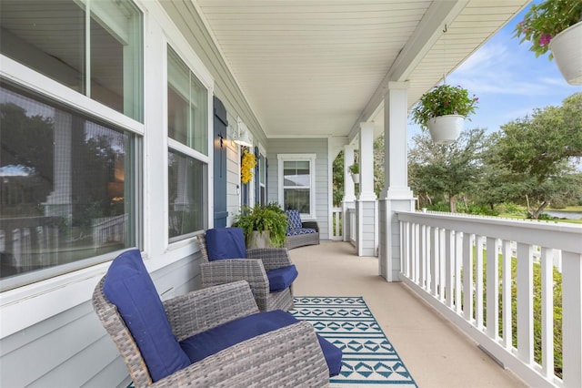 balcony featuring covered porch