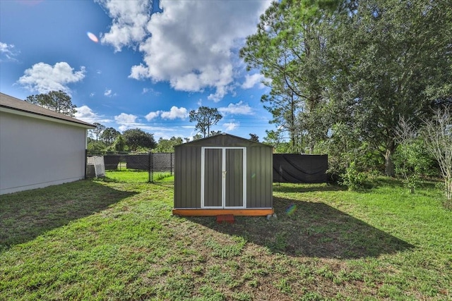 view of outdoor structure featuring a yard