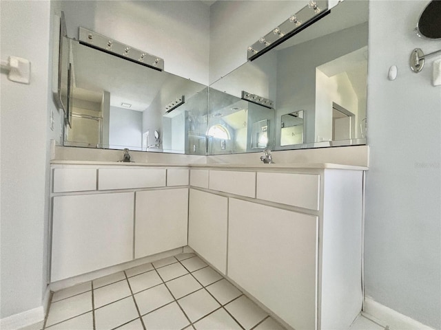 bathroom featuring vanity and tile patterned flooring