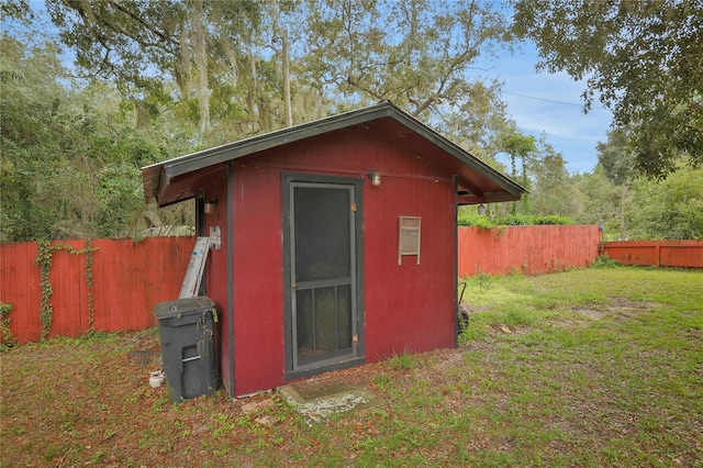 view of outdoor structure with a yard