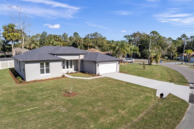 single story home with a front yard and a garage