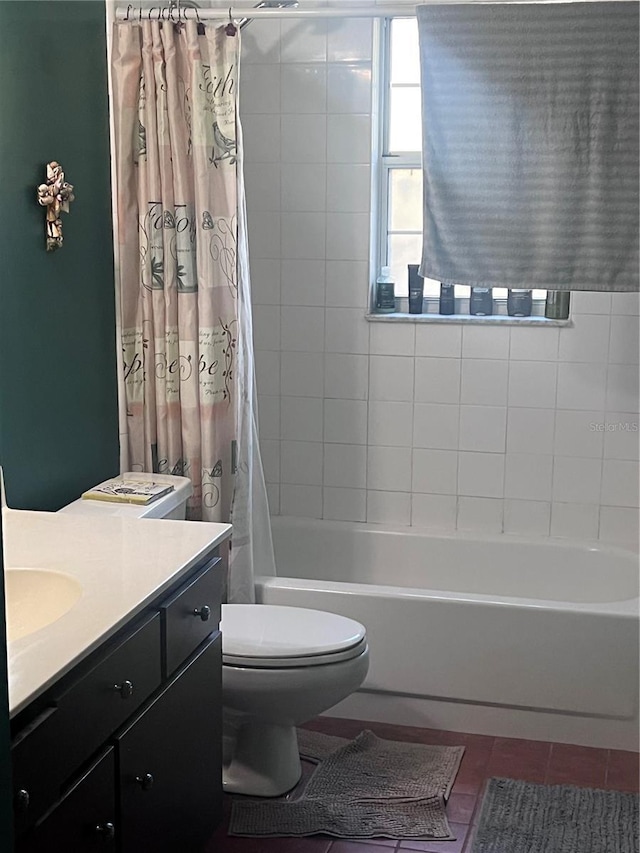 full bath with toilet, shower / tub combo, tile patterned flooring, and vanity