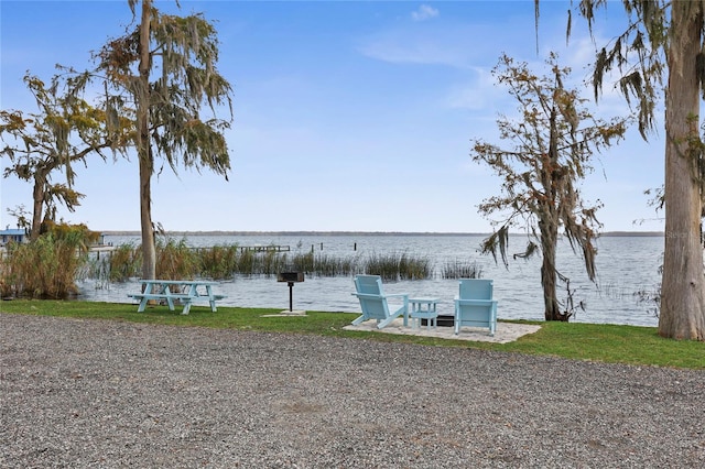 view of dock with a water view