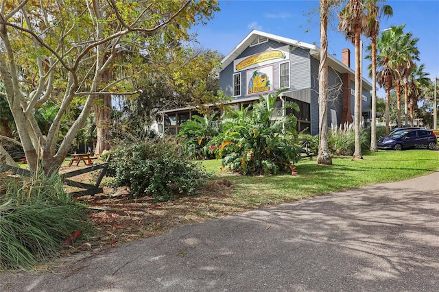 view of property exterior featuring a yard