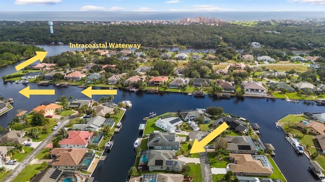 birds eye view of property featuring a water view