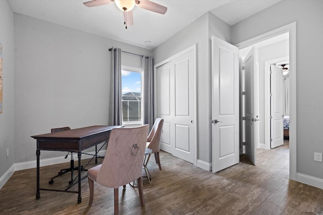 office featuring dark hardwood / wood-style floors and ceiling fan