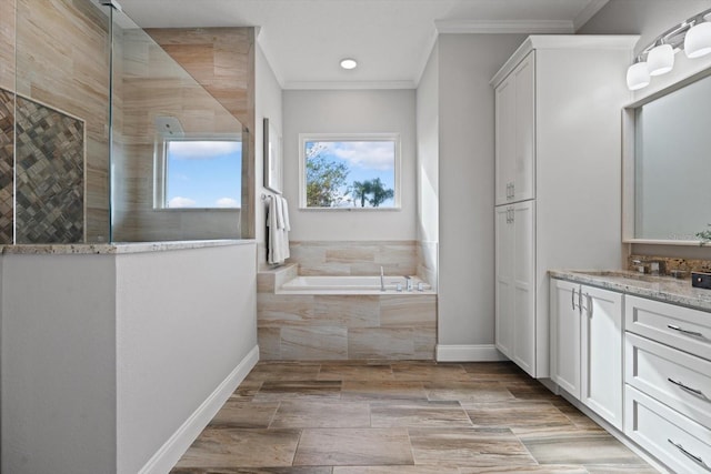 bathroom featuring vanity, plus walk in shower, ornamental molding, and wood-type flooring