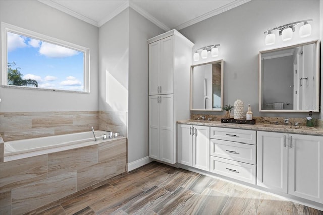 bathroom featuring vanity, hardwood / wood-style floors, crown molding, and tiled bath