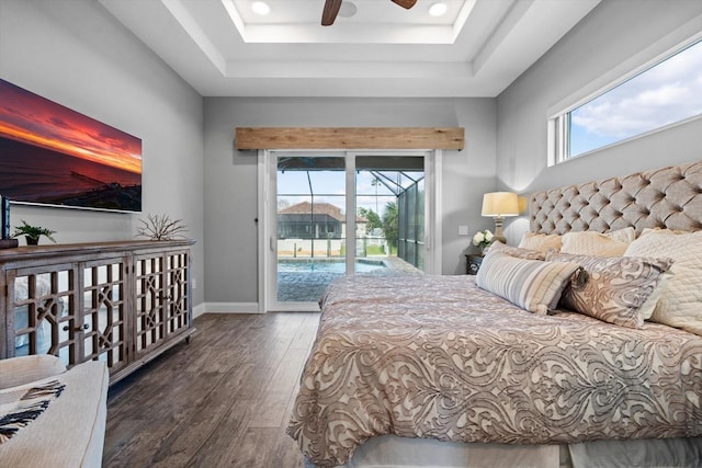 bedroom with dark wood-type flooring, multiple windows, access to outside, and ceiling fan