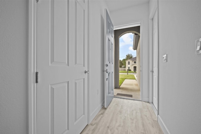 entryway with light hardwood / wood-style flooring