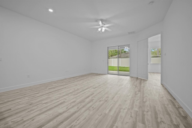 unfurnished room featuring light hardwood / wood-style flooring and ceiling fan