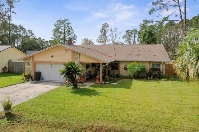 ranch-style house with a front yard and a garage